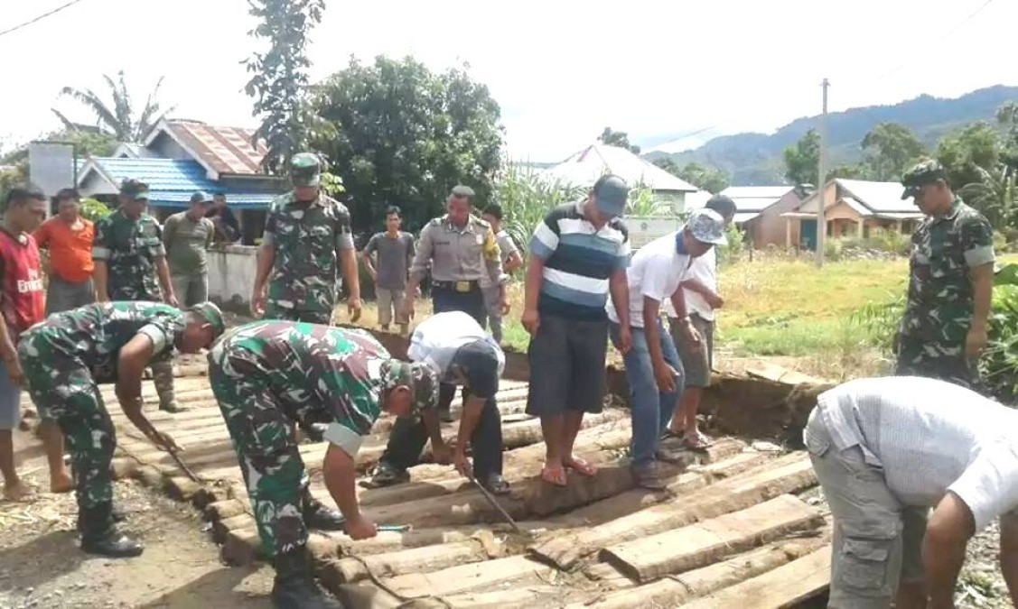 Koramil 409 -03 PUT Bangun Jembatan